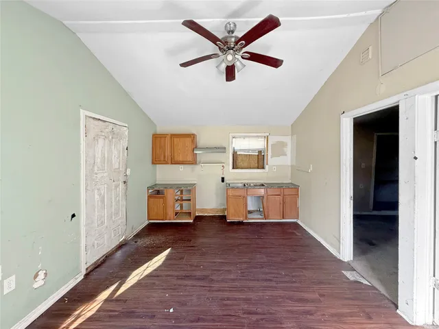 a room with furniture and a window