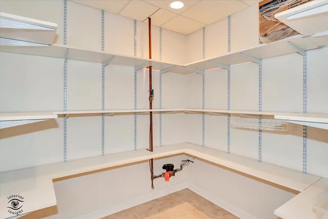 a bathroom with a tub and a window