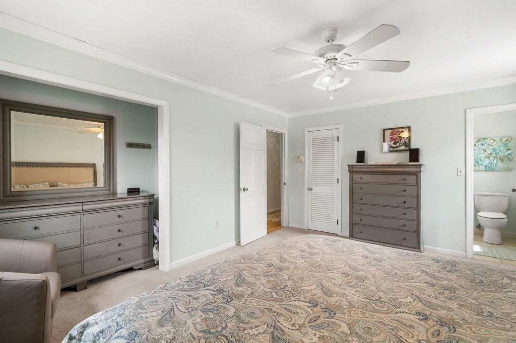 13 Uptack Road Groveland, MA 01834 - Photo 19 of 42 a bedroom with a bed and a dresser