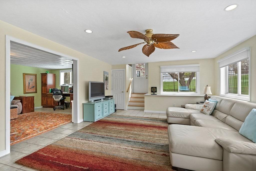 13 Uptack Road Groveland, MA 01834 - Photo 30 of 42 a living room with furniture and a large window