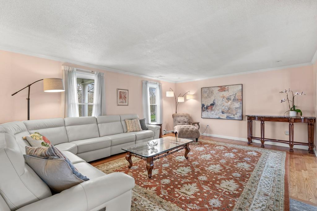 13 Uptack Road Groveland, MA 01834 - Photo 5 of 42 a living room with furniture and a wooden floor