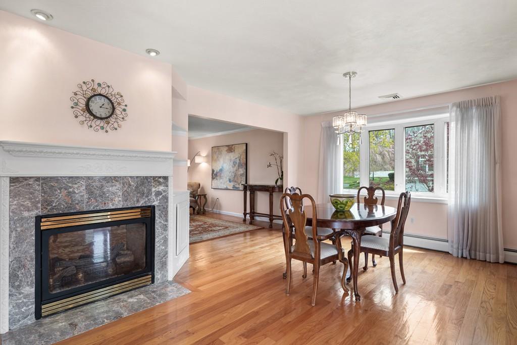 13 Uptack Road Groveland, MA 01834 - Photo 8 of 42 a view of a dining room with furniture window and wooden floor
