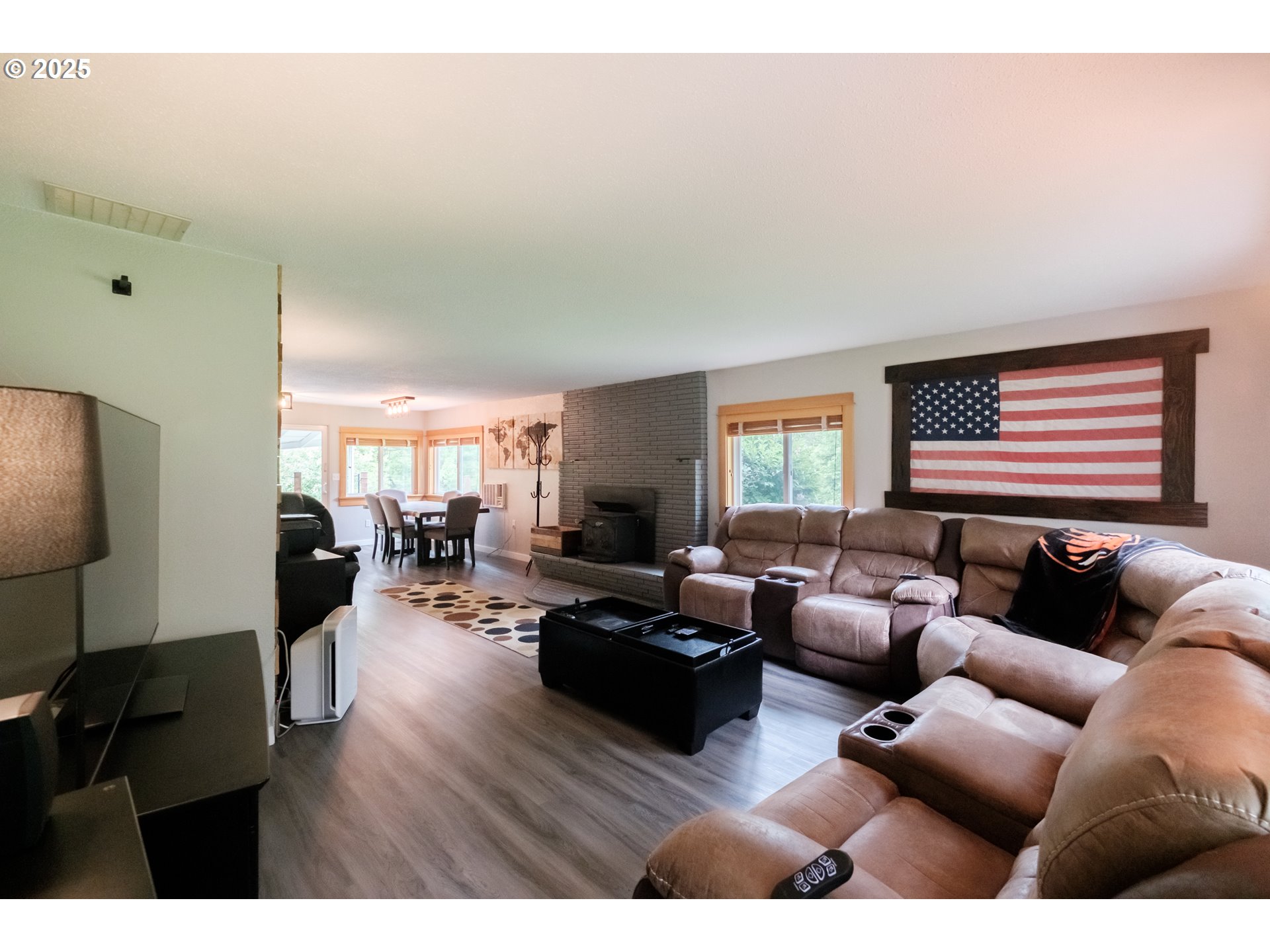 40325 Upper Calapooia Drive Sweet Home, OR 97386 - Photo 14 of 42 a living room with furniture and a flat screen tv