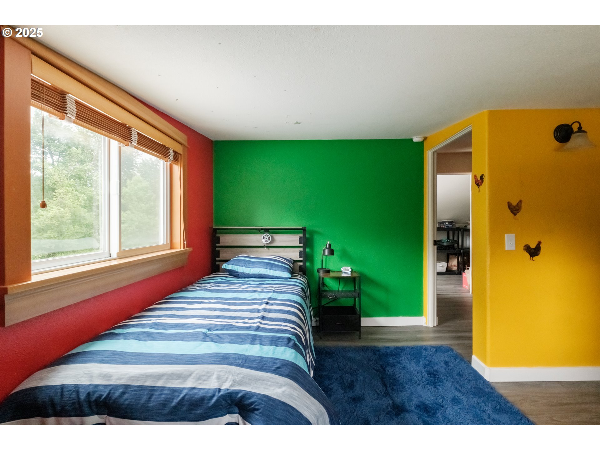 40325 Upper Calapooia Drive Sweet Home, OR 97386 - Photo 21 of 42 a bedroom with a bed and a window