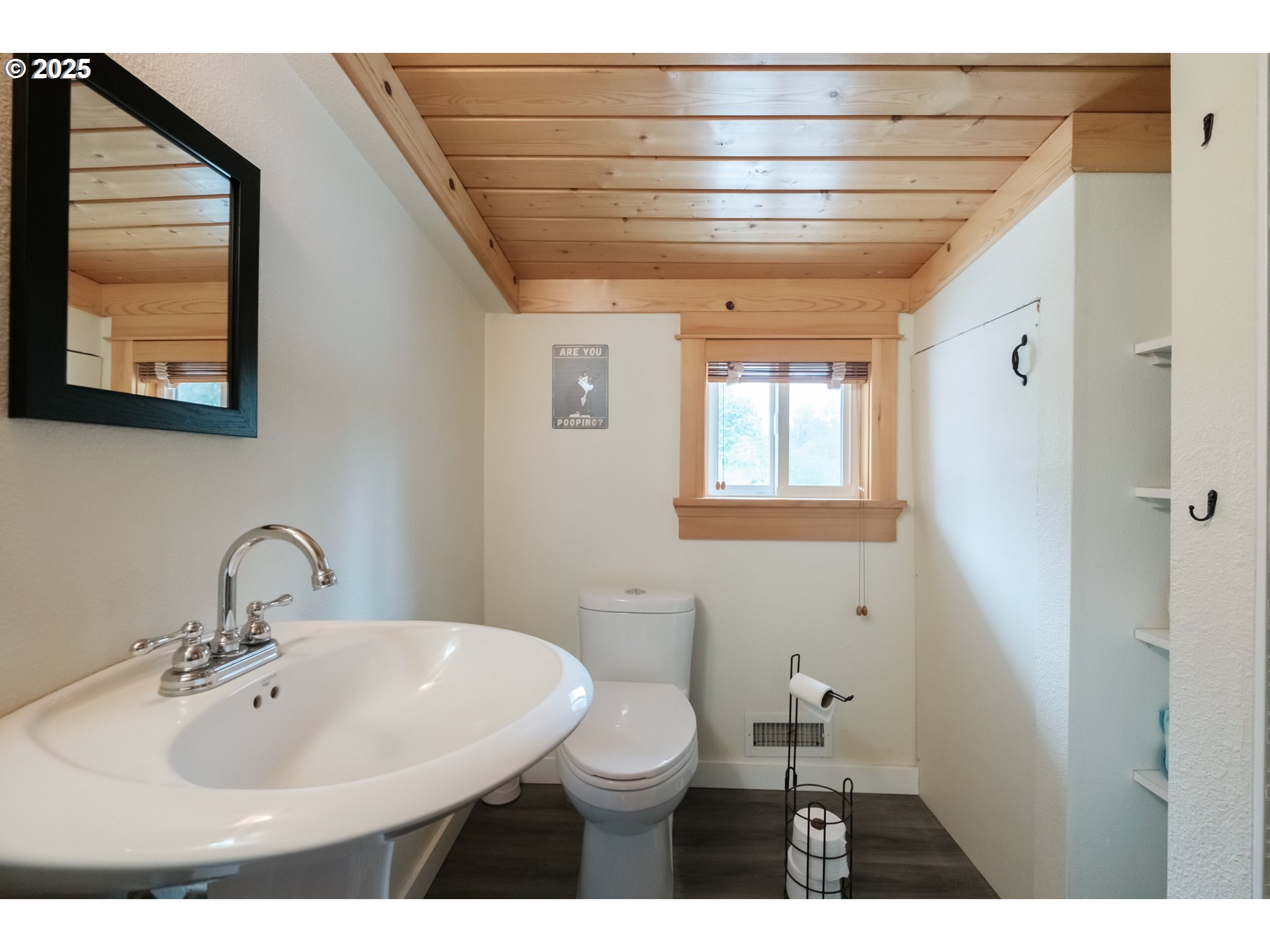40325 Upper Calapooia Drive Sweet Home, OR 97386 - Photo 23 of 42 a bathroom with a double vanity sink toilet and a mirror