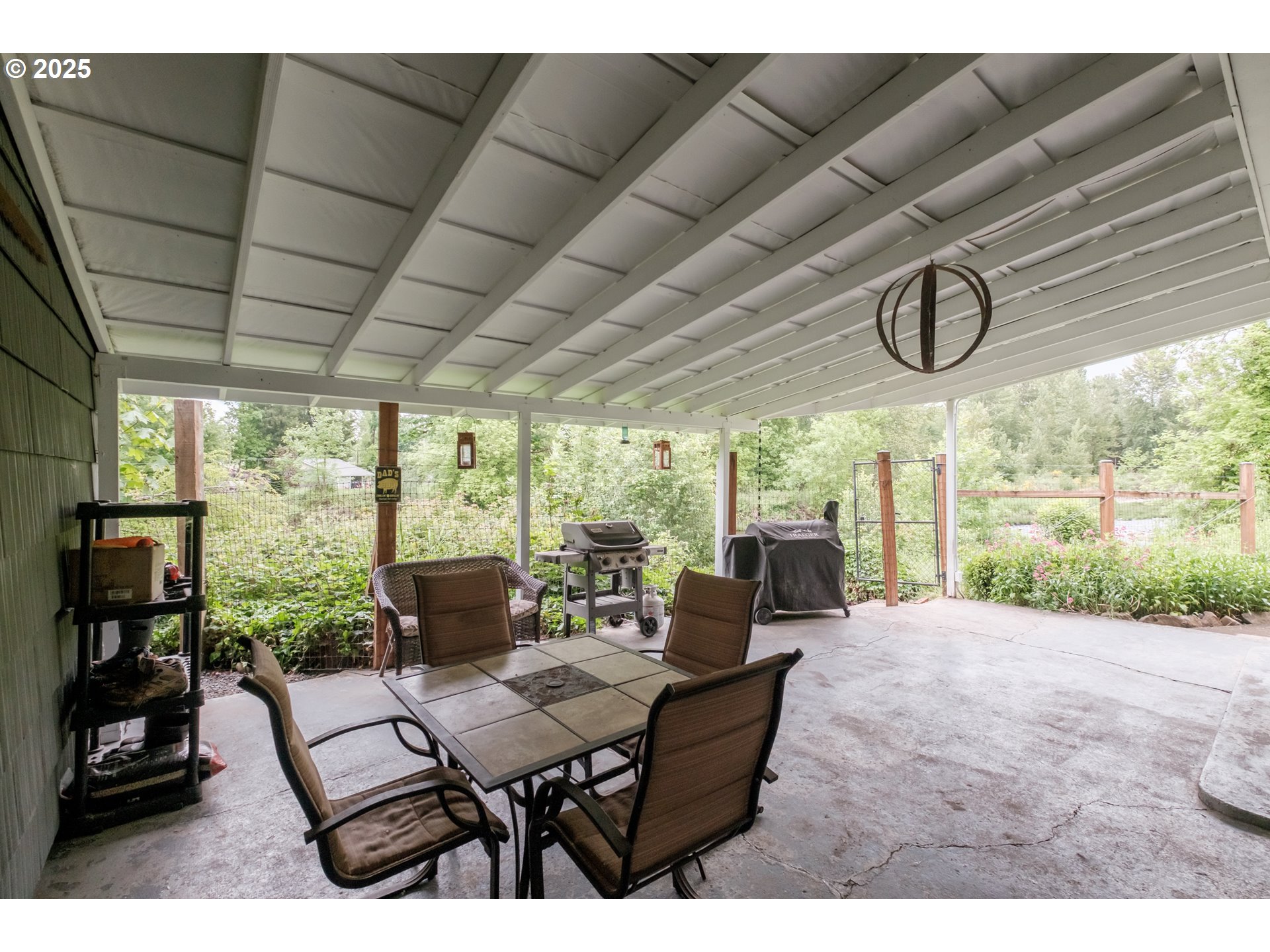 40325 Upper Calapooia Drive Sweet Home, OR 97386 - Photo 28 of 42 a view of a dining room with furniture window and outside view