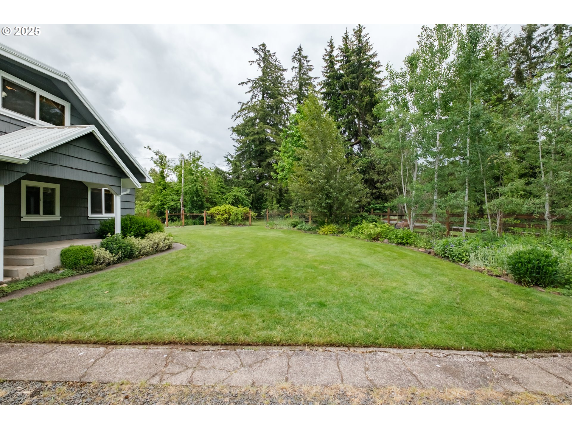 40325 Upper Calapooia Drive Sweet Home, OR 97386 - Photo 29 of 42 a front view of a house with a yard