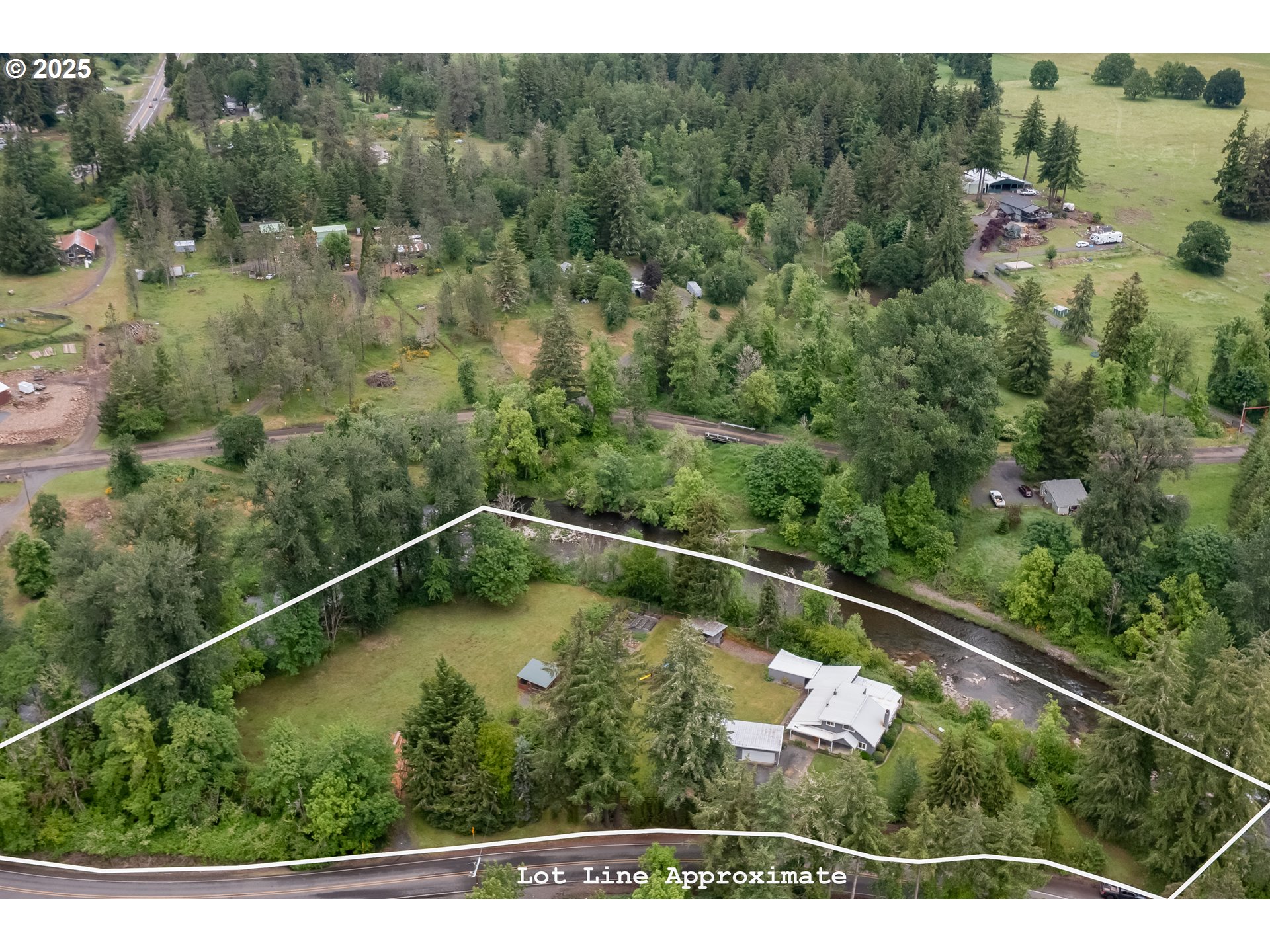 40325 Upper Calapooia Drive Sweet Home, OR 97386 - Photo 39 of 42 a view of a forest with a small yard
