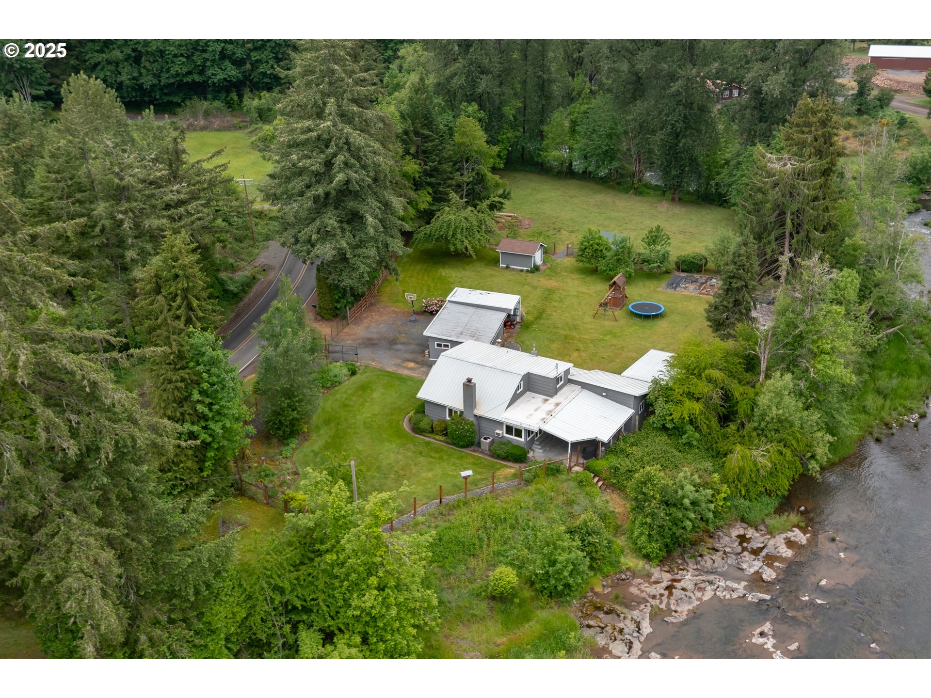 40325 Upper Calapooia Drive Sweet Home, OR 97386 - Photo 40 of 42 a view of a house with a yard