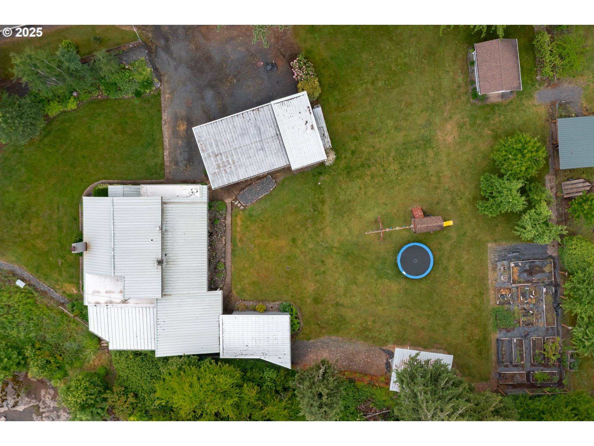 40325 Upper Calapooia Drive Sweet Home, OR 97386 - Photo 42 of 42 an aerial view of a house with a yard