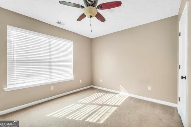 a view of a room with a window