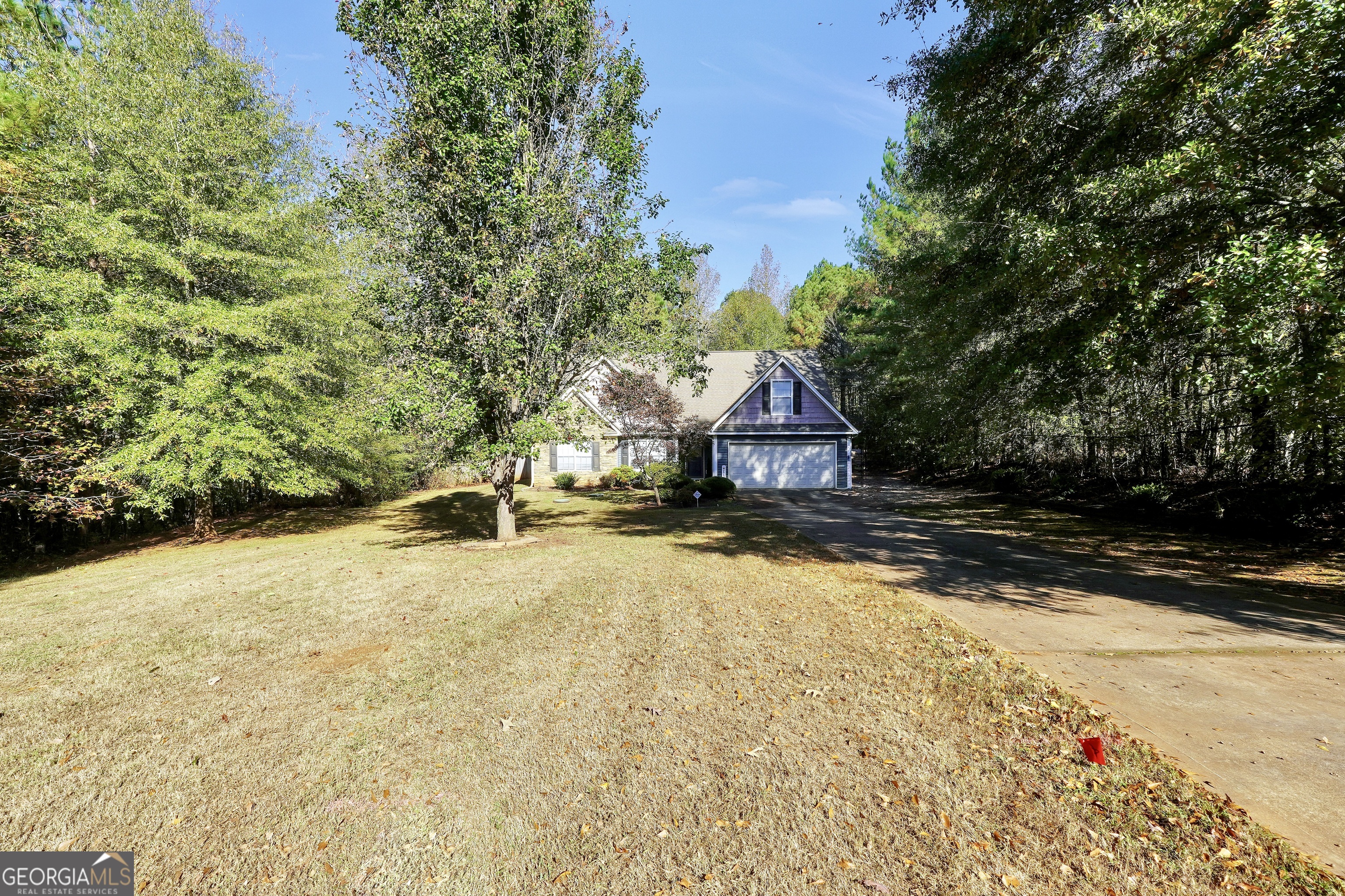 610 Kyle Court Locust Grove, GA 30248 - Photo 3 of 35 a view of backyard of house