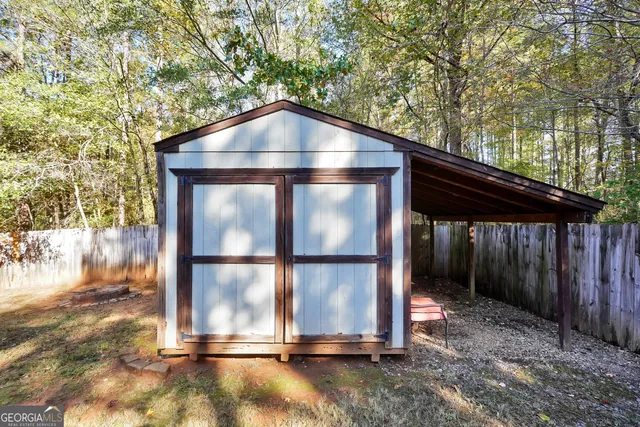 a wooden door in front of a house