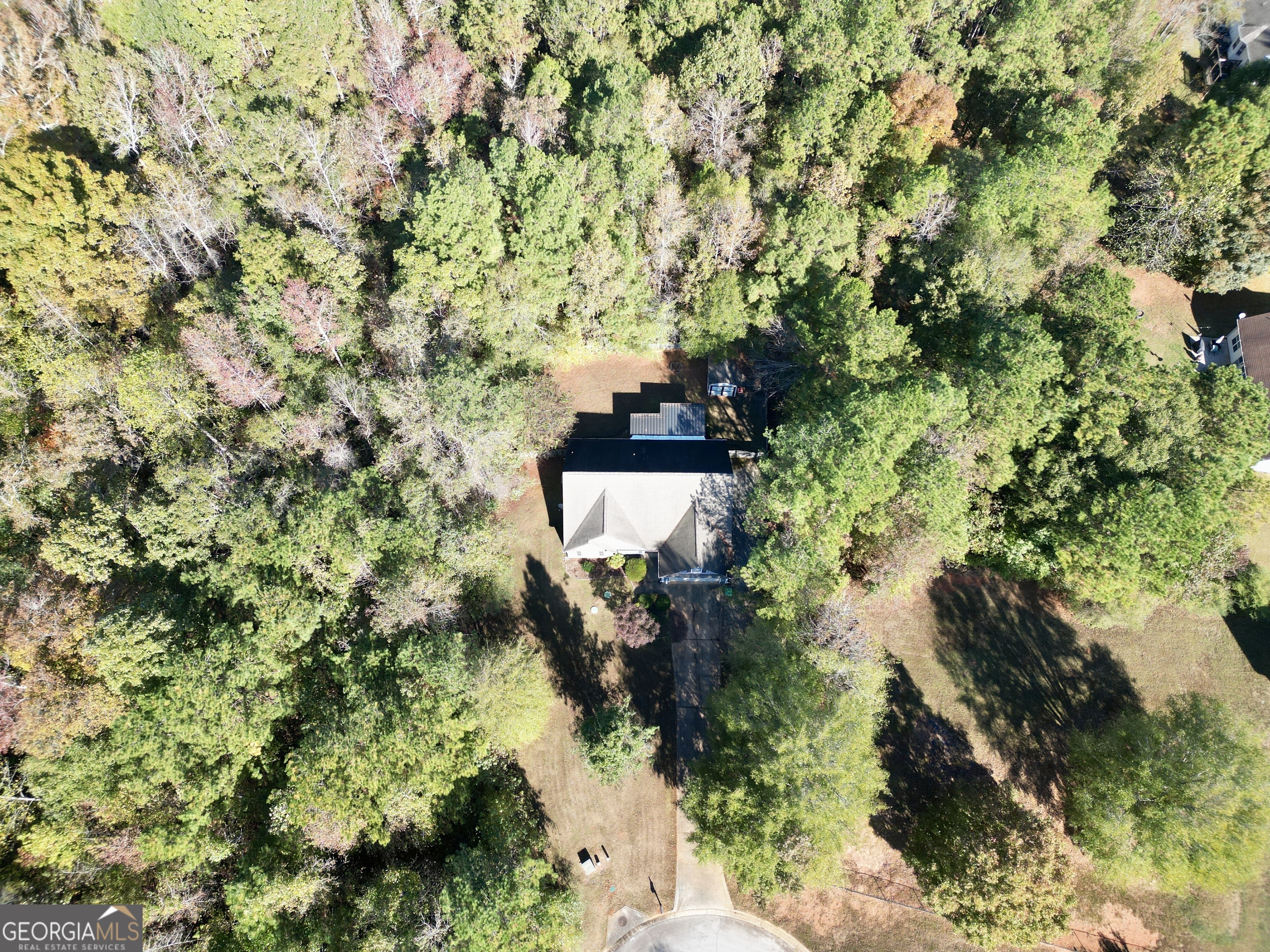 610 Kyle Court Locust Grove, GA 30248 - Photo 5 of 35 an aerial view of a house with a yard