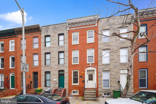 a front view of a building with street