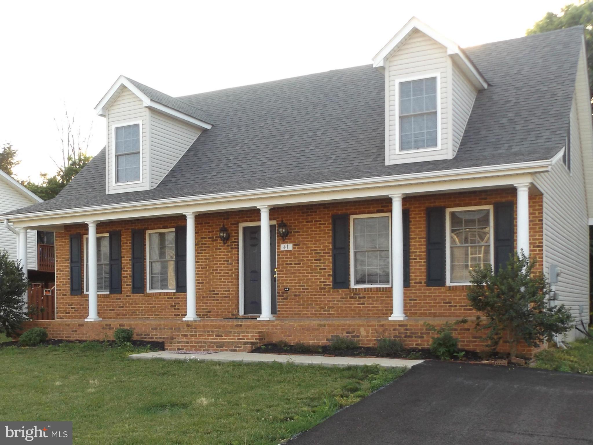 front view of house with a yard