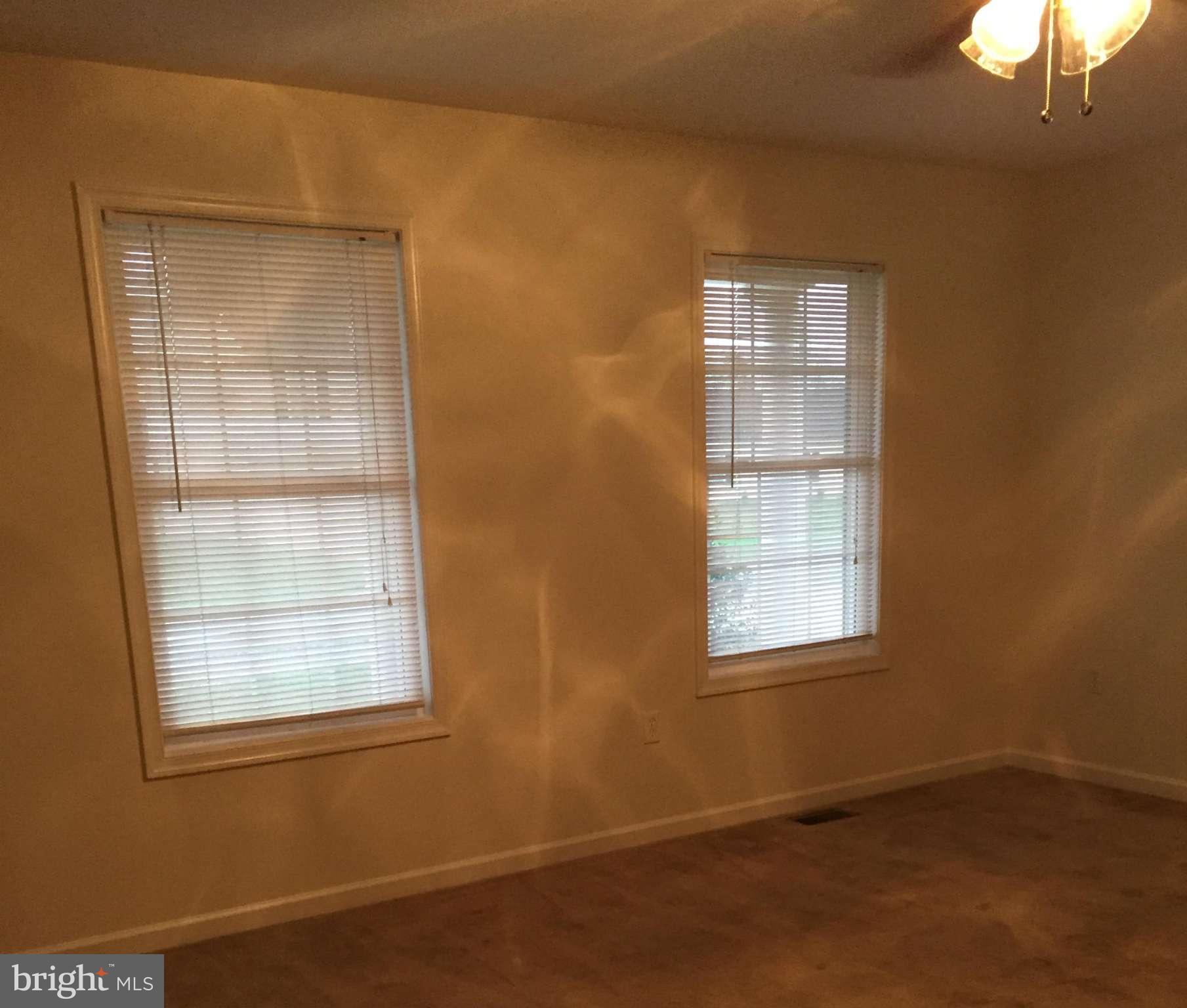 41 Gibson Road Inwood, WV 25428 - Photo 14 of 26 an empty room with a window