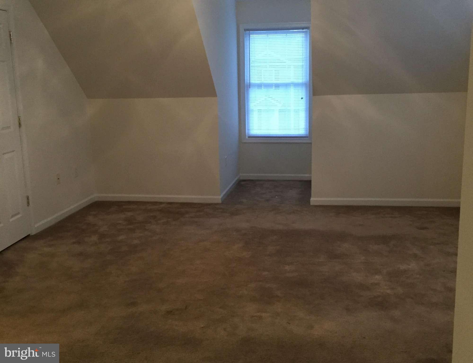 41 Gibson Road Inwood, WV 25428 - Photo 24 of 26 an empty room with a window
