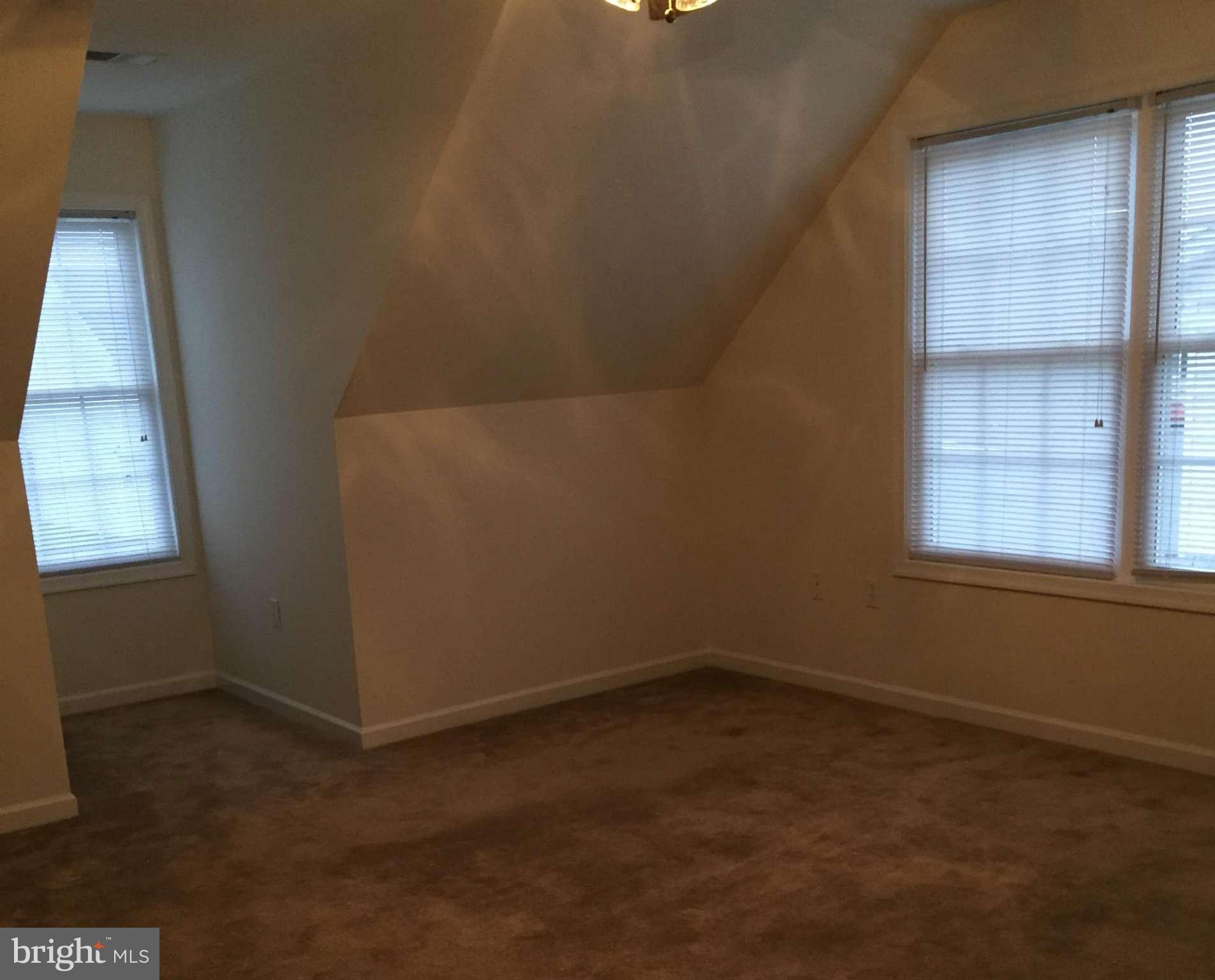41 Gibson Road Inwood, WV 25428 - Photo 25 of 26 an empty room with windows