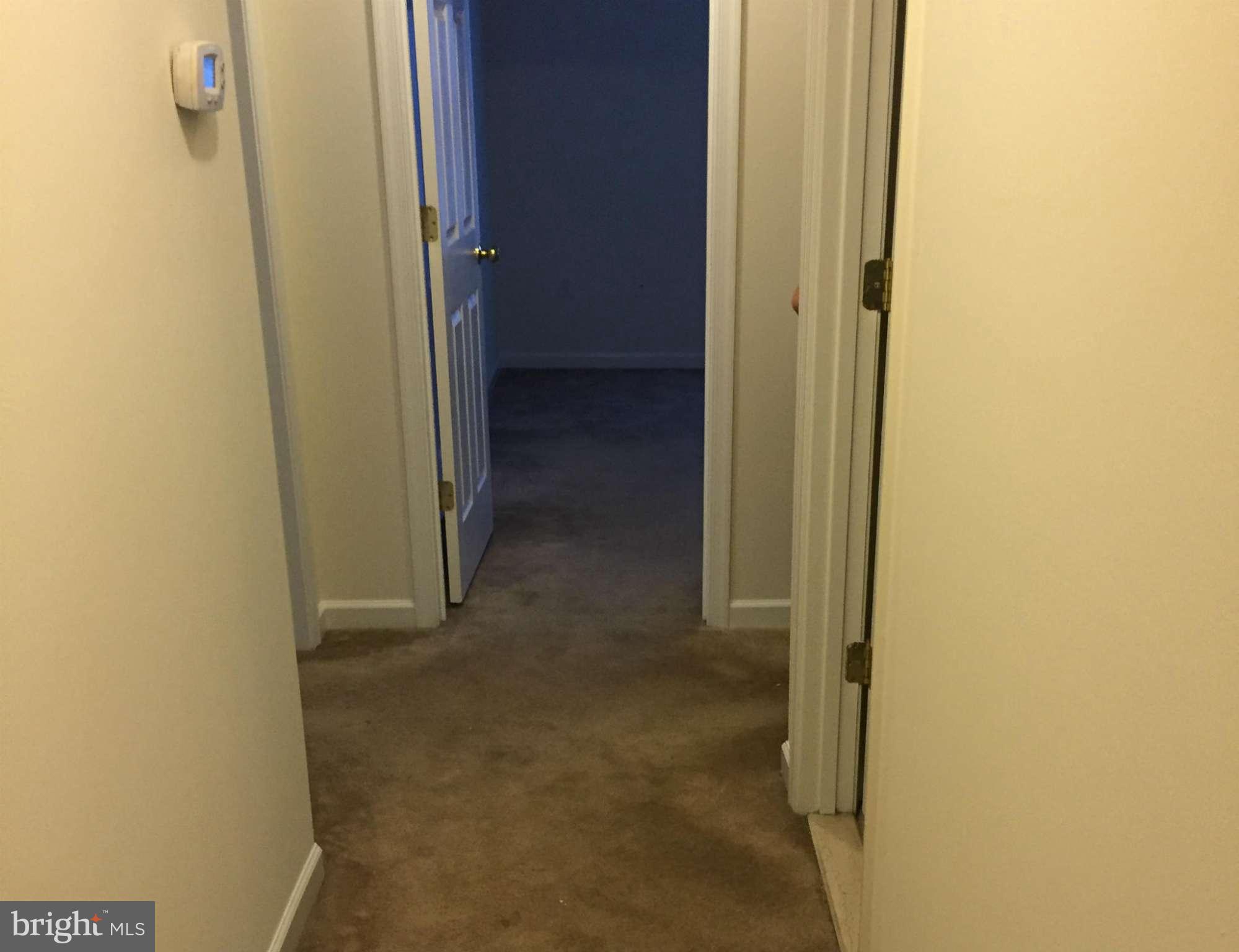 41 Gibson Road Inwood, WV 25428 - Photo 26 of 26 a view of a hallway with wooden wall