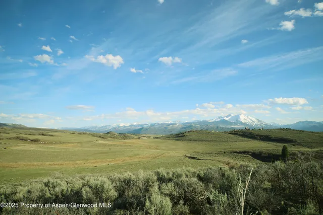a view of a city with an ocean