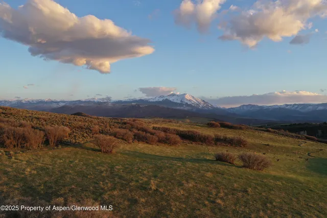 a view of lake and mountain