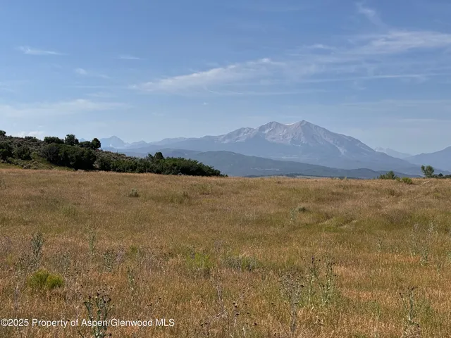 a view of lake and mountain