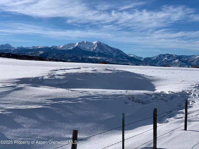 a view of a lake with a mountain