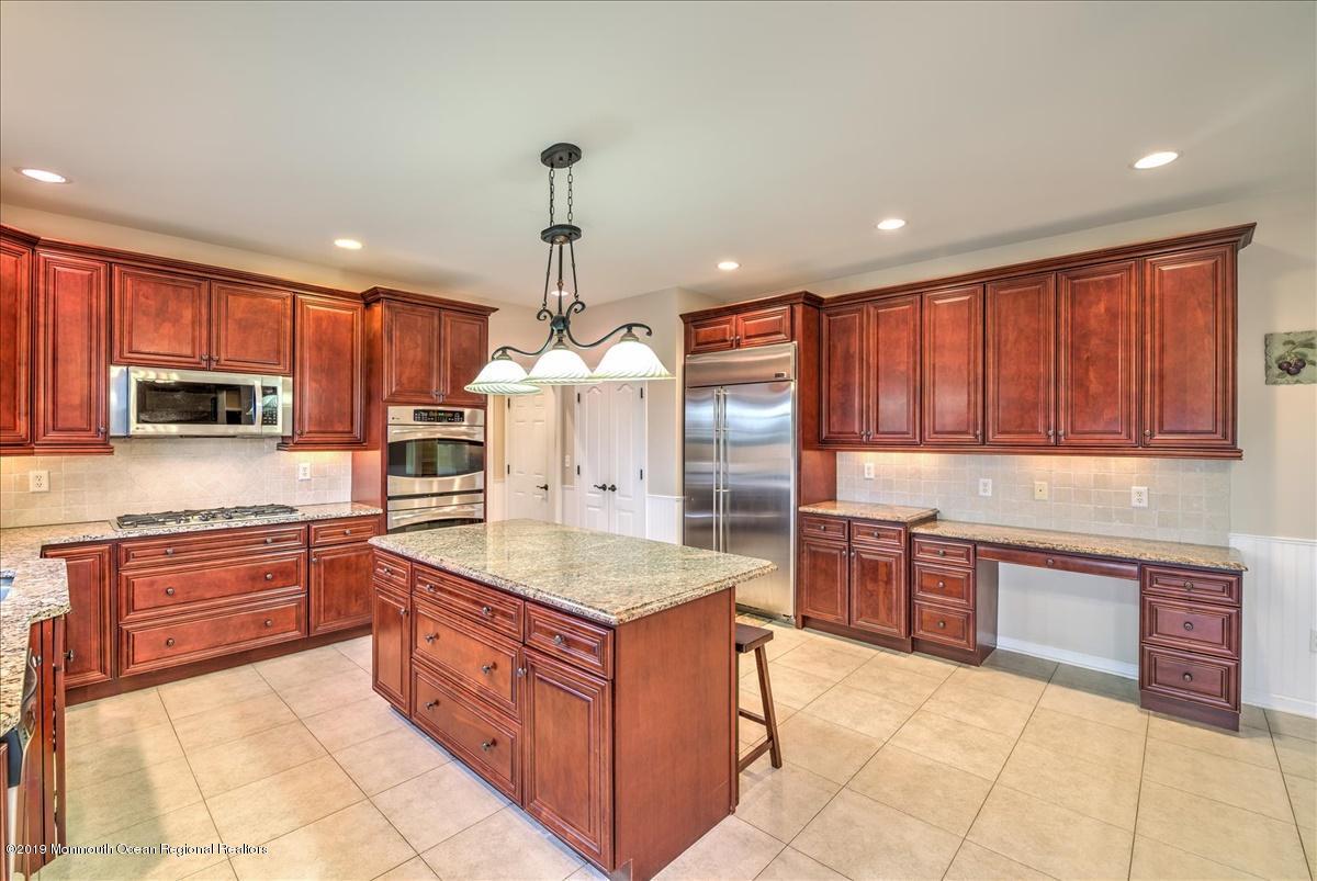3 Yellow Meetinghouse Road Millstone Township, NJ 08510 - Photo 13 of 29 a large kitchen with stainless steel appliances granite countertop a stove and large cabinets