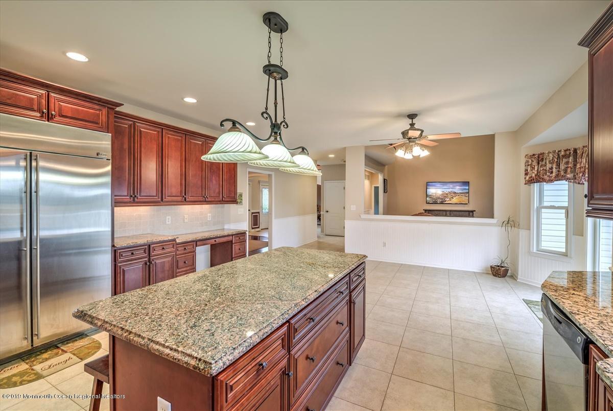 3 Yellow Meetinghouse Road Millstone Township, NJ 08510 - Photo 15 of 29 a kitchen with kitchen island a counter top space appliances and cabinets