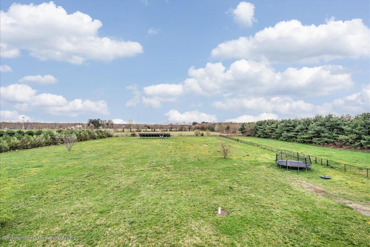 3 Yellow Meetinghouse Road Millstone Township, NJ 08510 - Photo 28 of 29 a view of a lake with a yard