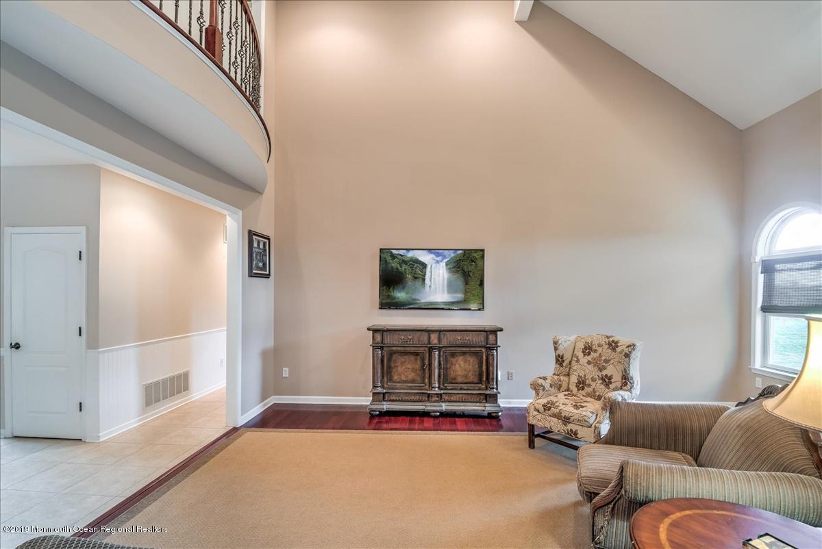 3 Yellow Meetinghouse Road Millstone Township, NJ 08510 - Photo 6 of 29 a living room with furniture and a fireplace