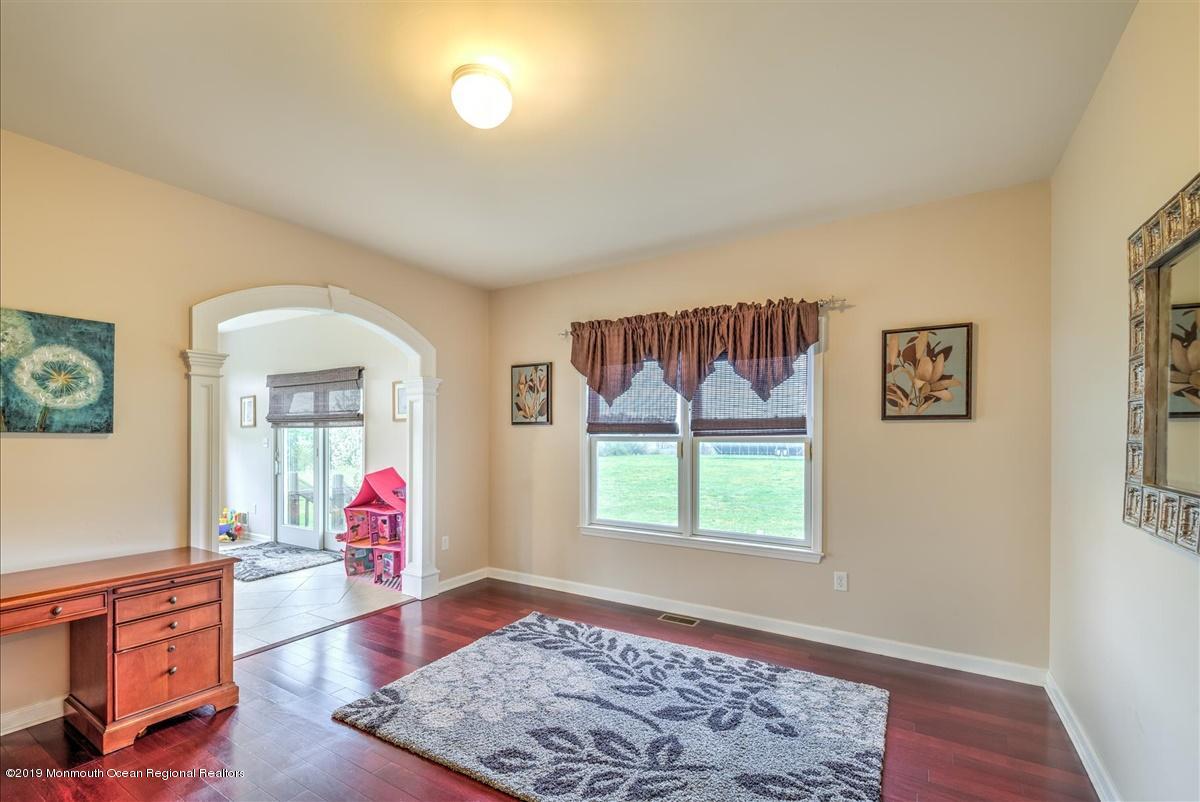 3 Yellow Meetinghouse Road Millstone Township, NJ 08510 - Photo 8 of 29 a living room with furniture and a window