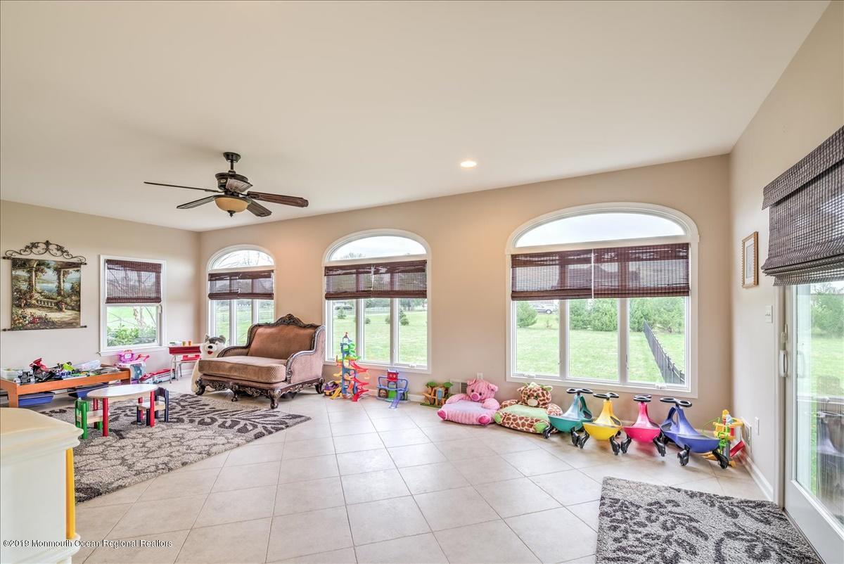 3 Yellow Meetinghouse Road Millstone Township, NJ 08510 - Photo 9 of 29 a living room with furniture and a large window