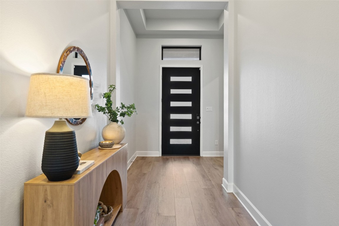 321 Allegheny Way Kyle, TX 78640 - Photo 25 of 40 Foyer featuring light wood finished floors and baseboards