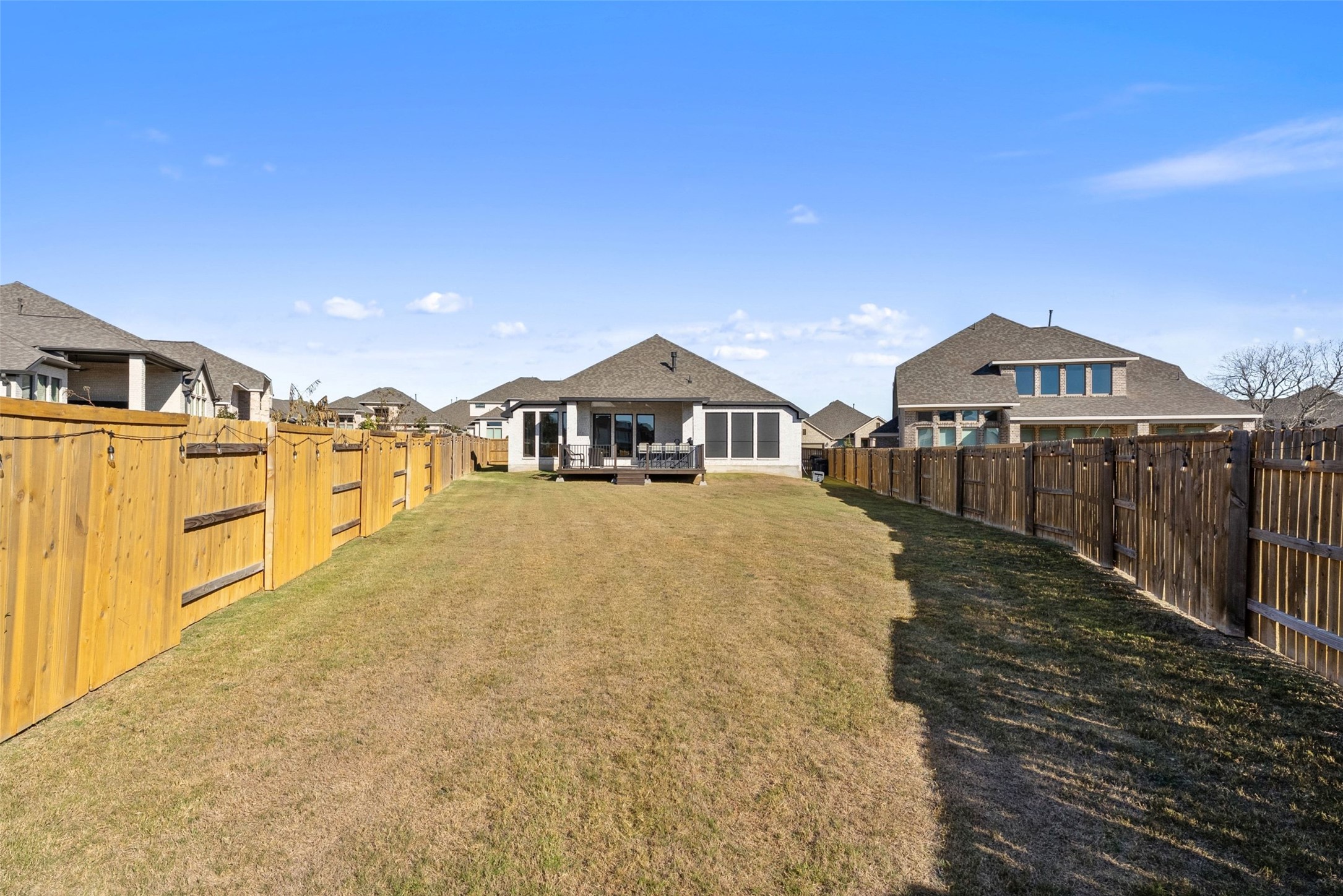 321 Allegheny Way Kyle, TX 78640 - Photo 33 of 40 a view of a house with wooden fence