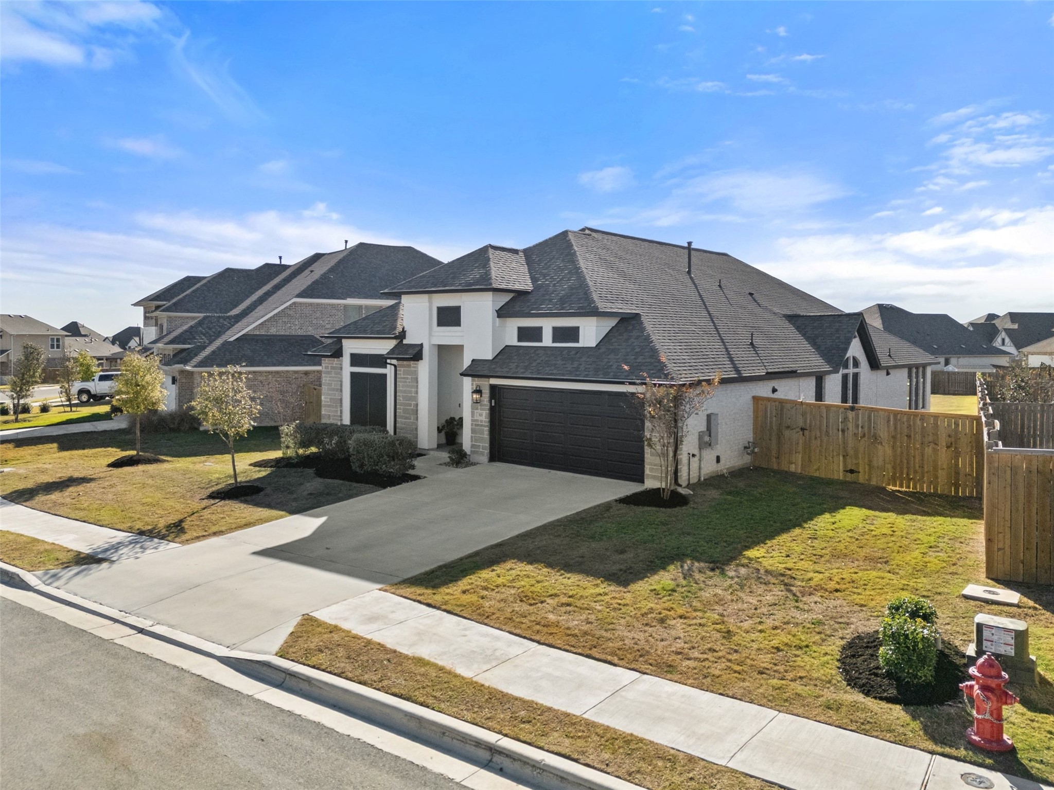 321 Allegheny Way Kyle, TX 78640 - Photo 40 of 40 a front view of a house with garden