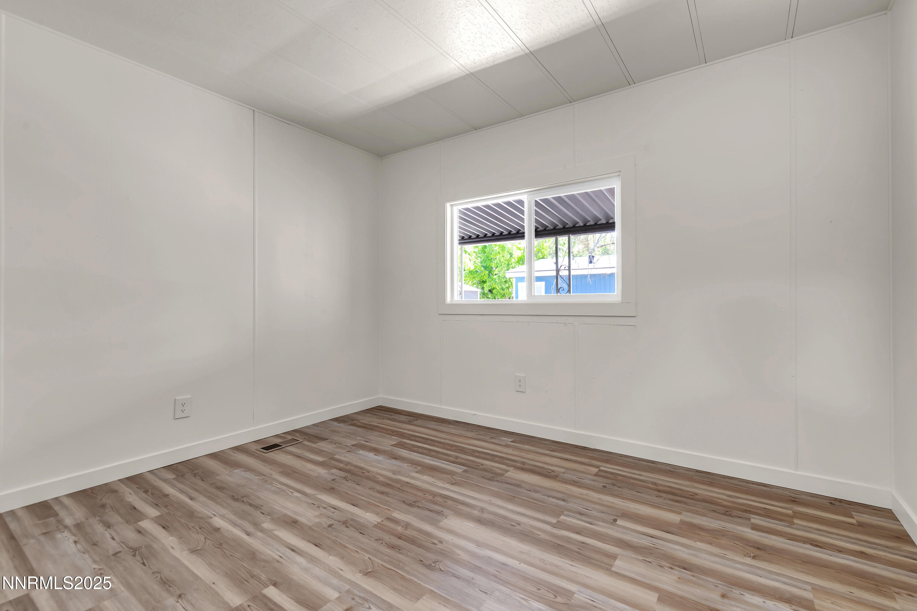 16385 Rhyolite Circle Reno, NV 89521 - Photo 29 of 50 an empty room with a window