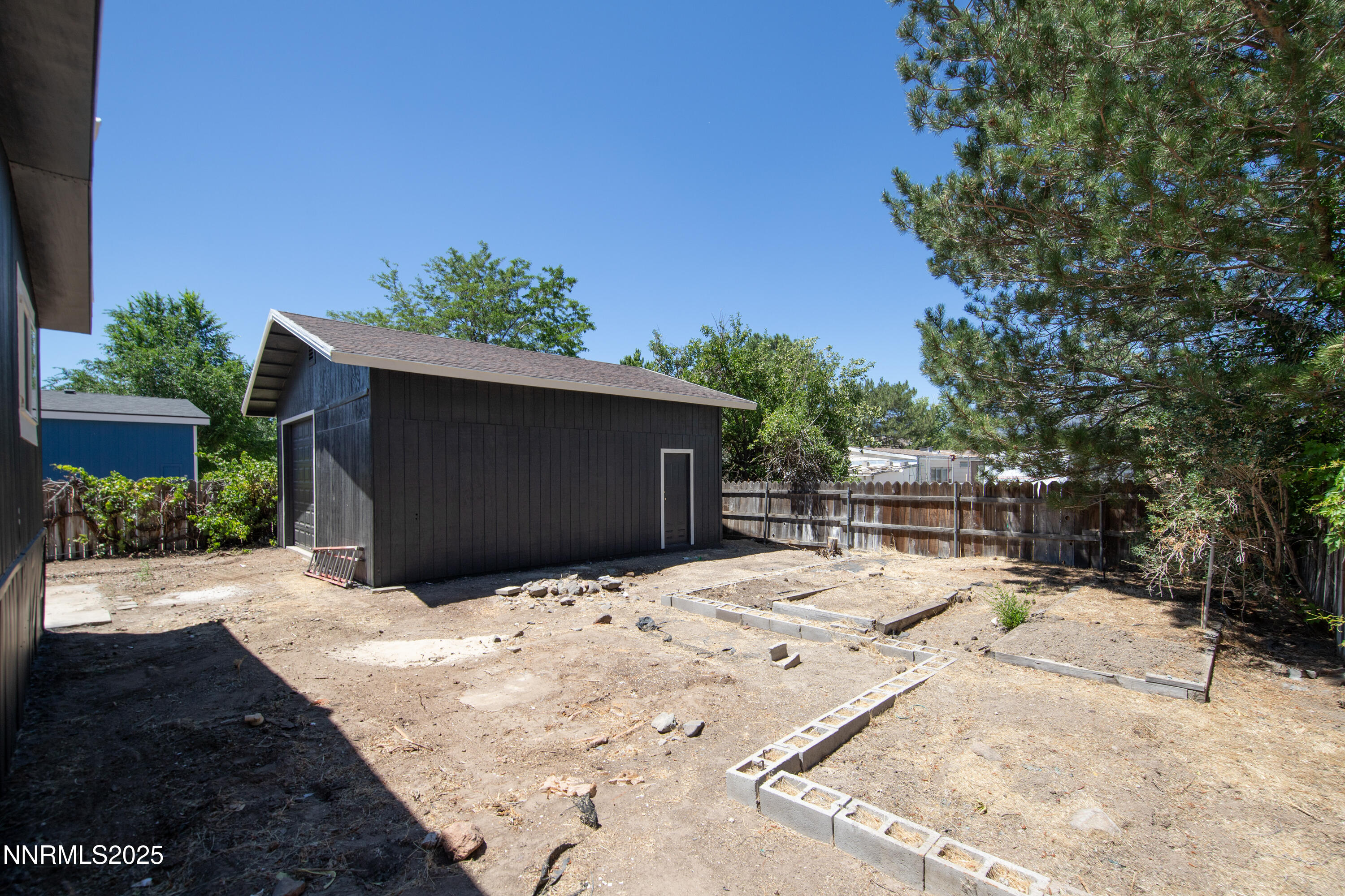 16385 Rhyolite Circle Reno, NV 89521 - Photo 31 of 50 a backyard of a house with lots of green space