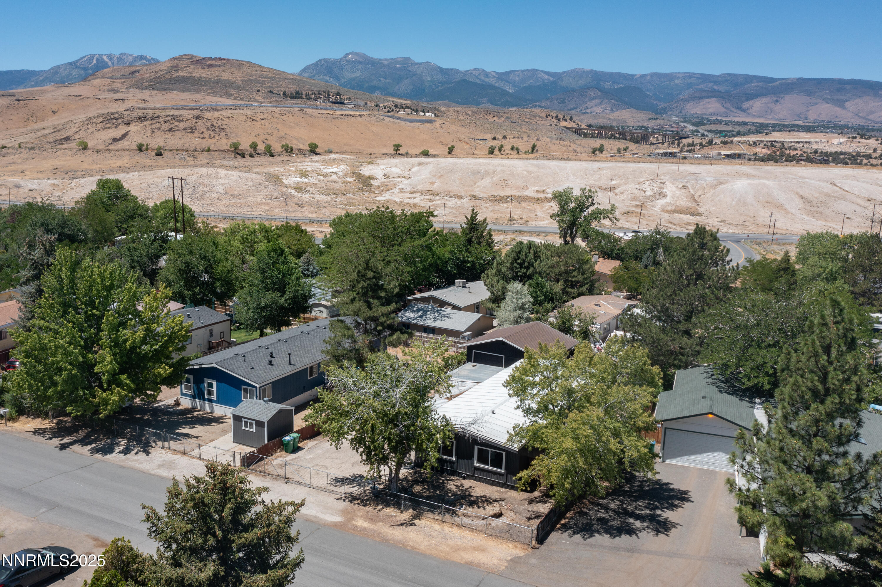 16385 Rhyolite Circle Reno, NV 89521 - Photo 39 of 50 an aerial view of a house with mountain view