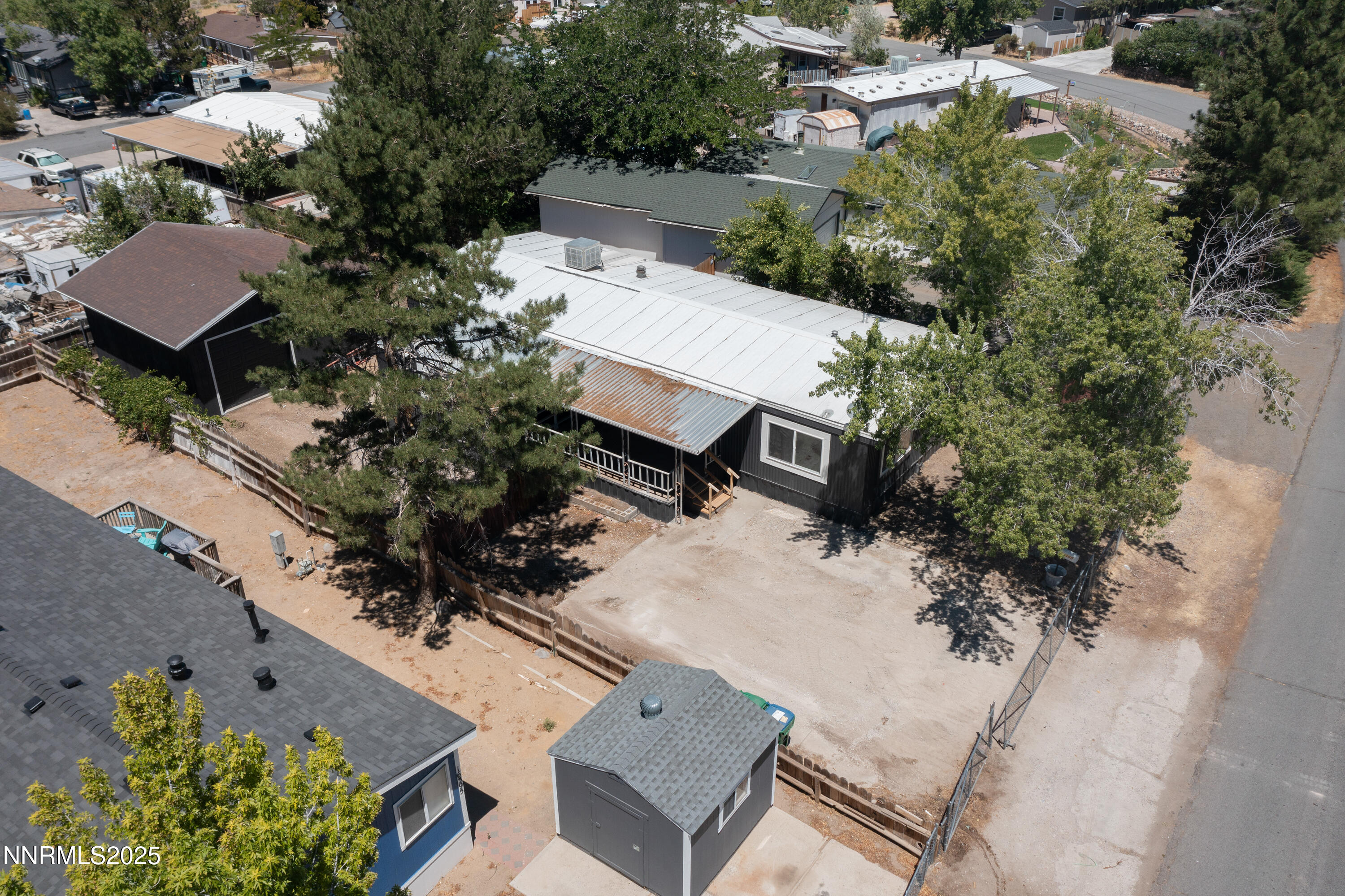 16385 Rhyolite Circle Reno, NV 89521 - Photo 42 of 50 an aerial view of a house with garden space and street view