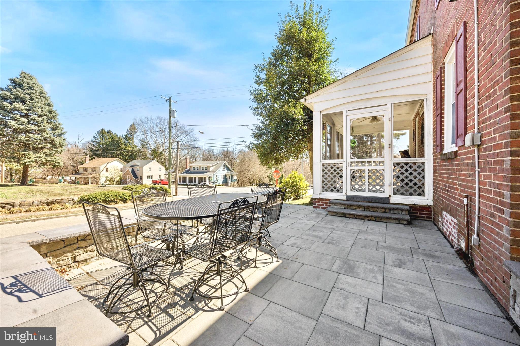 507 East Ridley Avenue Ridley Park, PA 19078 - Photo 2 of 18 a view of a patio with table and chairs and potted plants