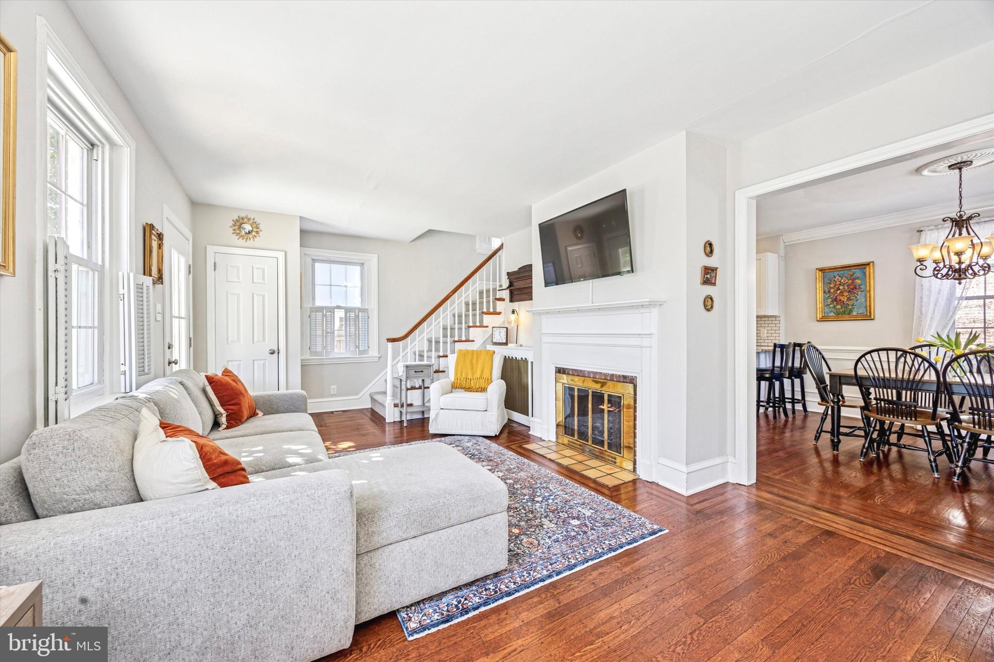 507 East Ridley Avenue Ridley Park, PA 19078 - Photo 4 of 18 a living room with furniture wooden floor and a fireplace