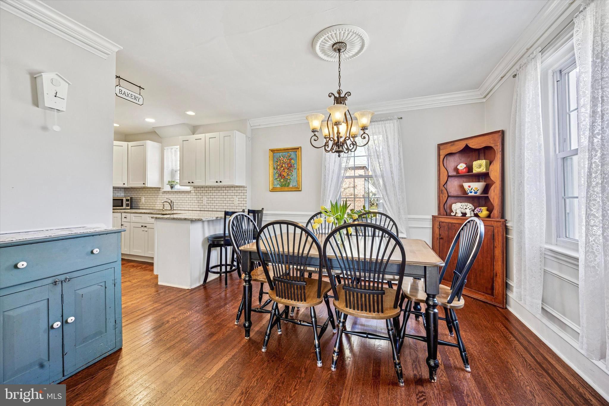 507 East Ridley Avenue Ridley Park, PA 19078 - Photo 6 of 18 a view of a dining room with furniture wooden floor and chandelier