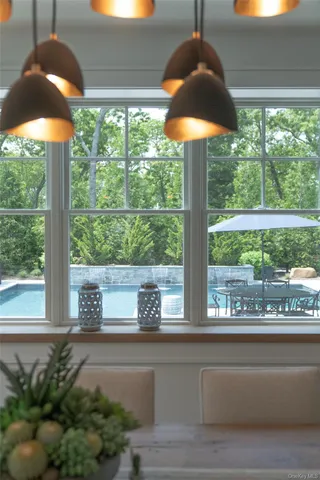 a utility room with sink dryer and washer