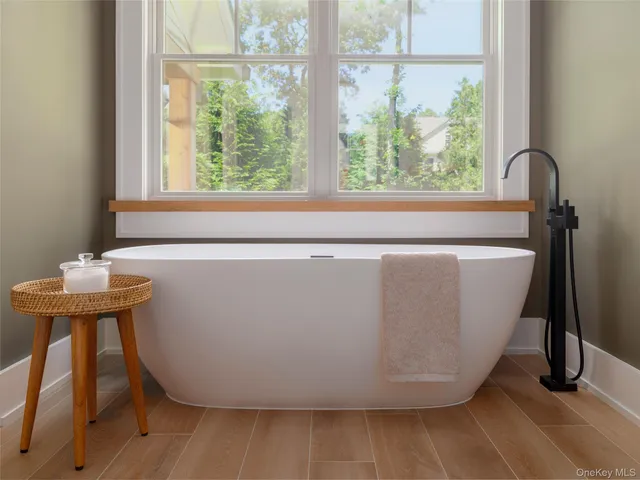 a view of a chair and table in the patio