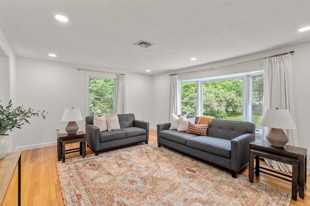 322 Concord Road Wayland, MA 01778 - Photo 7 of 35 a living room with furniture and a large window
