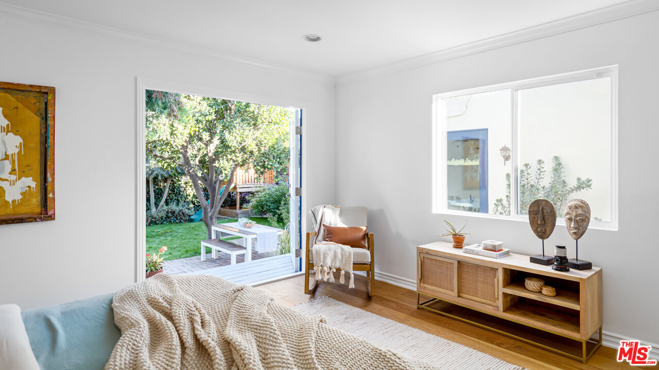 3420 Buckingham Road Los Angeles, CA 90016 - Photo 23 of 41 a bed room with a bed and a window