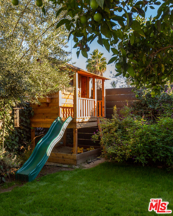 3420 Buckingham Road Los Angeles, CA 90016 - Photo 26 of 41 a view of a house with a yard