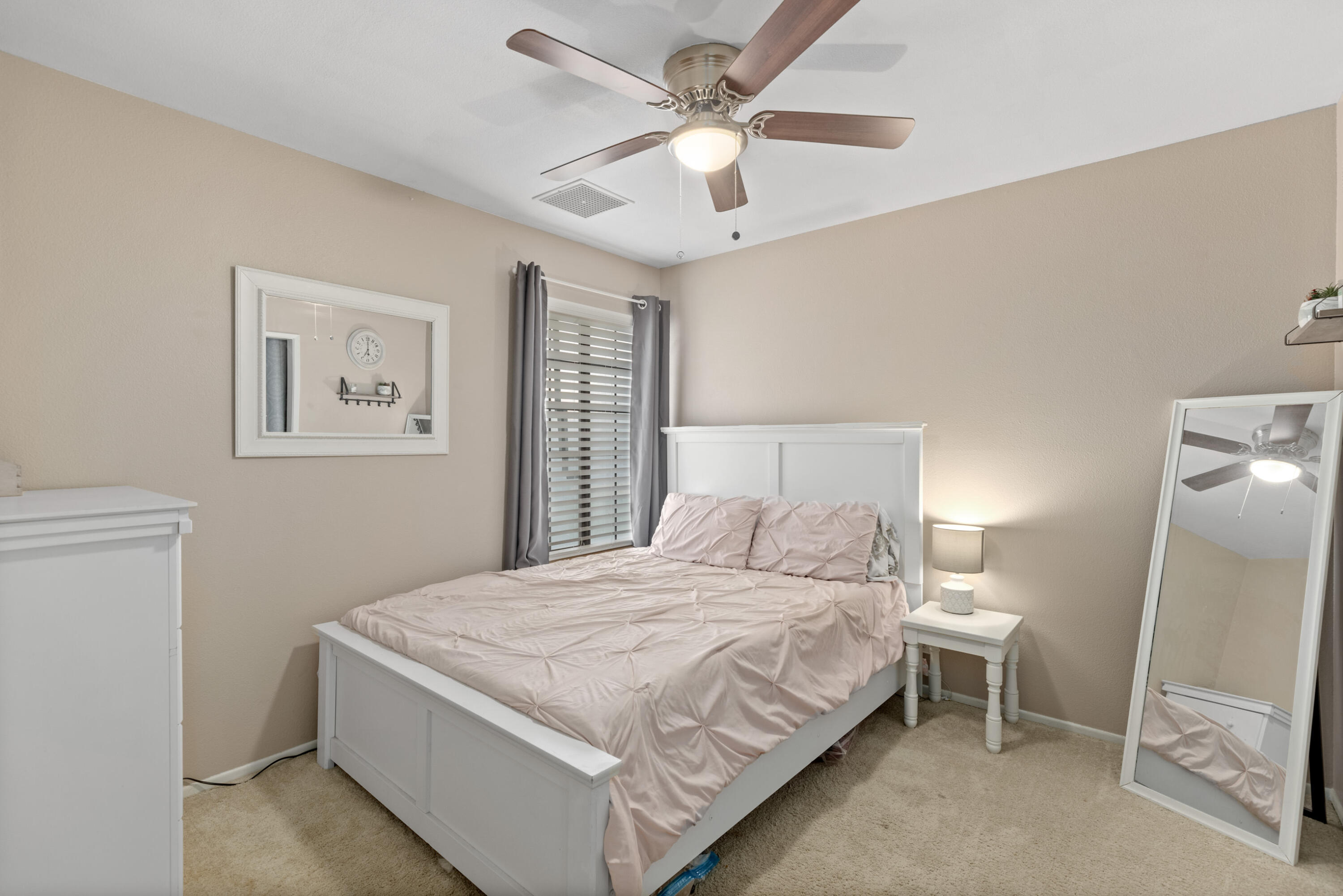 920 West Perch Avenue Ridgecrest, CA 93555 - Photo 19 of 26 a bedroom with a bed and a window